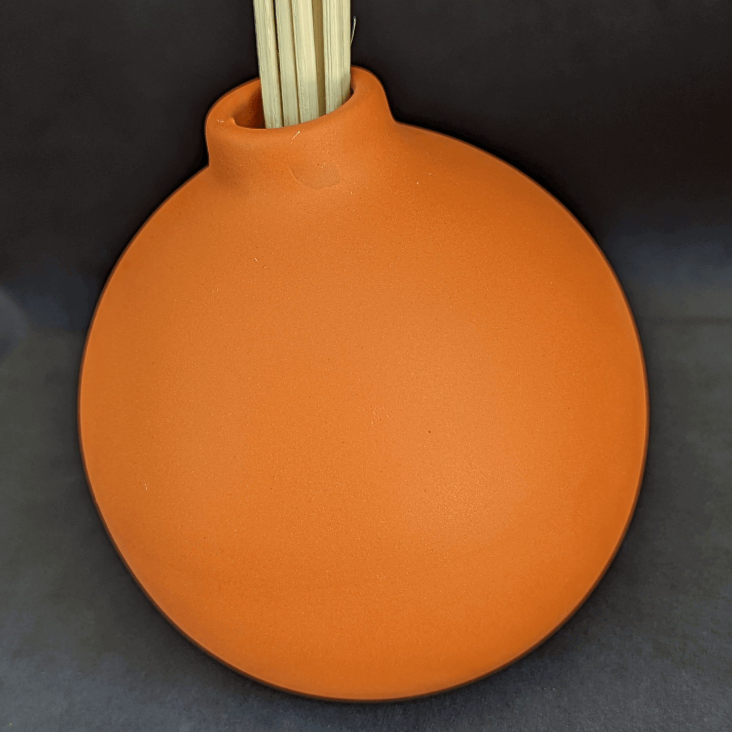 round orange vase home decor 